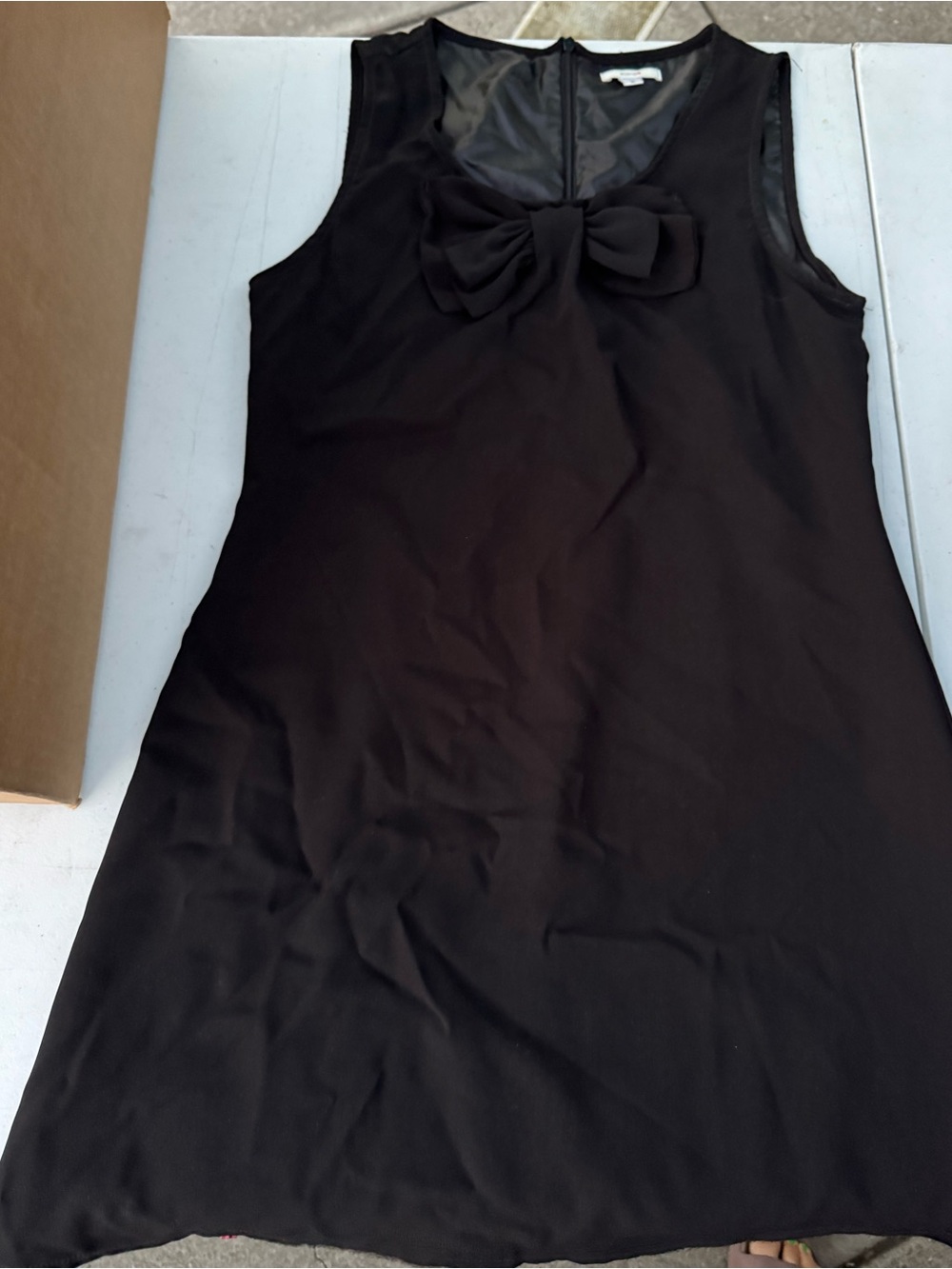 Kling Black Sleeveless Mini Dress with Front Bow